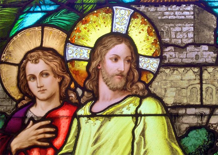 Jesus and St. John depicted in a stained glass window