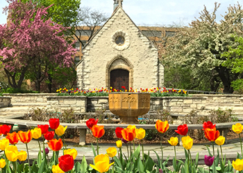 St. Joan of Arc Chapel behind tulips